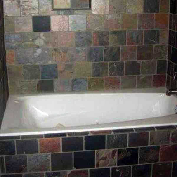 Slate tile tub enclosure in Norcross GA