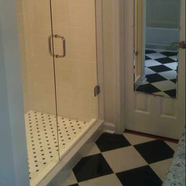 Black and white tile bathroom remodel in Roswell GA