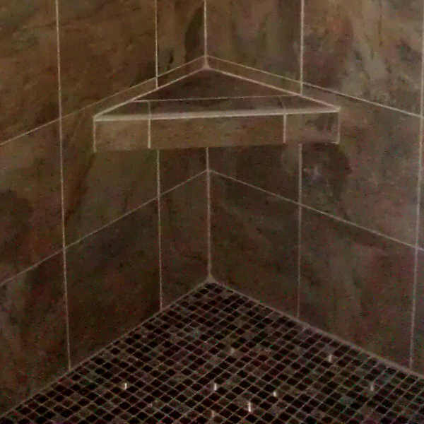 Tile shower shelf from a bathroom remodel in Dawsonville GA